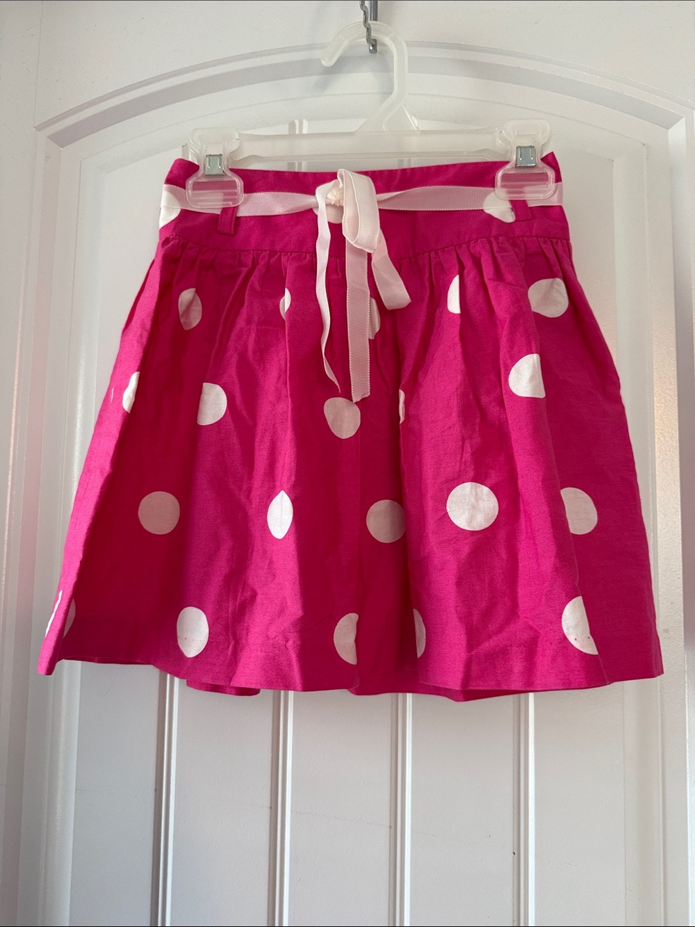 Gently worn Hot Pink Polka Dot Skirt with White Ribbon